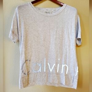 Calvin Klein Womens performance Tee. Gray with reflective logo. SIZE S